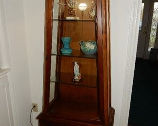 Mixed wood lighted curio cabinet