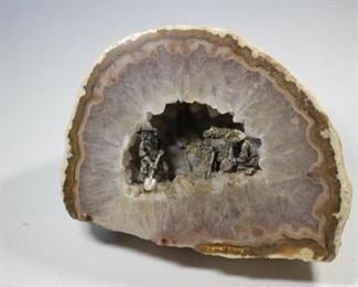 Geode with interior mining scene