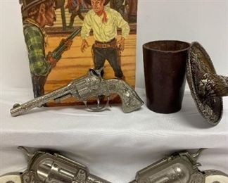 Pony Boy Cap Star Toy Guns, Wyatt Earp Book, Leather Drinking Cup,  Metal Hat