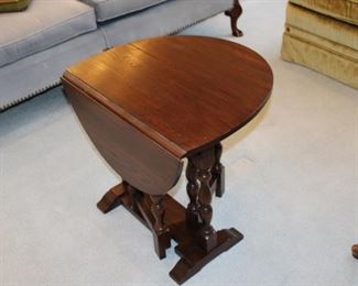 Drop Leaf Table with Leg Supports for Leafs.