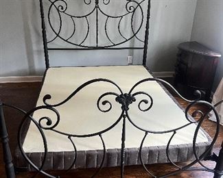 Metal scrollwork queen bed