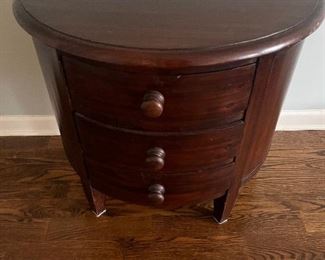 Pair of Indonesian handmade demilune night stands 