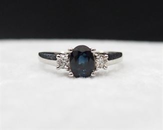 10K White Gold Oval Cut Sapphire And Diamond Ring Approx 3/4 Carat 7x5mm Sapphire And .12 TW Diamond, Size 7
