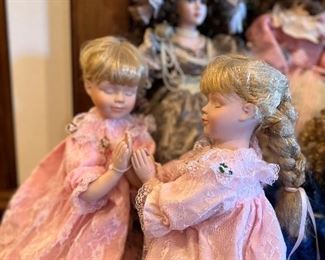 Vintage praying porcelain dolls