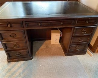 Antique partner desk with leather top. $350