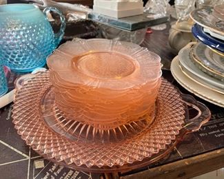 Pink cut glass serving plates with dishes