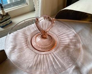 Pink depression glass plates, glasses & candlesticks