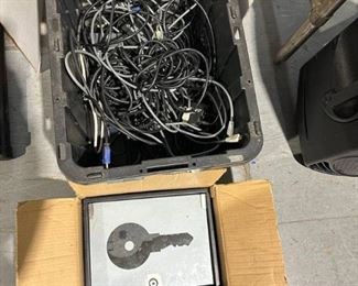 Bin Full of HDMI Chords and Lock Box for Keys