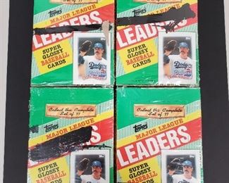 Lot46	1960's Topps Baseball (25) Card Lot w/ Elston Howard
Lot47	1987 Fleer Glossy Bo Jackson PSA 9 MINT
Lot48	1989 Upper Deck #13 Gary Sheffield Rookie BGS 9.5 GEM-MINT
Lot49	2006 Justifiable Preview #7 Tim Linecum Rookie Auto /200 BGS 9 MINT
Lot50	1997 Topps Chrome Baseball Factory Sealed Hobby Box Look For Refractors