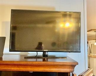 32"Samsung flat screen television on the entertainment center