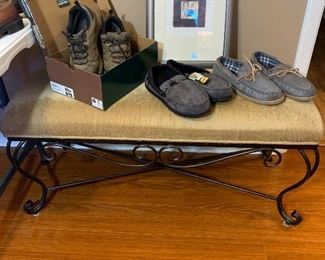 The shoes in this picture are sitting on an upholstered bench that looks like it was bought yesterday!