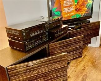 This shows the large compartments open. Sitting on the entertainment center is the 50" Panasonic plasma flat screen television. The other components will be described in the next picture.