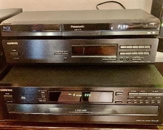 The three items in this picture are the Panasonic Blue Ray DVD player, the Onkyo Amplifier, and the 6-disc compact disc player.