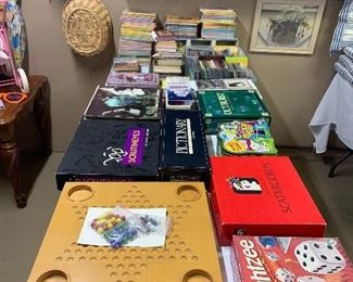 These games may be found in the garage. Chinese Checkers, Pictionary, Bunco, Mexican Train, and Dominoes are a few of the many games on the table.