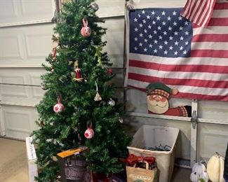 The artificial Christmas tree comes apart in 3 sections and is 6- 7 feet tall.