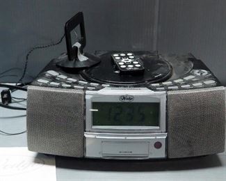 HP Lazer Pro Jet Printer, Model # M12W, And Wedge AM-FM Digital Clock Radio, Model # A4116