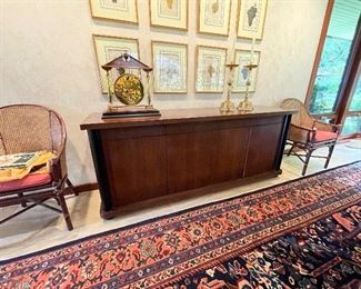 Contemporary wood buffet signed McGuire. Has large dining table and twelve chairs to match. See next photos. Excellent condition.