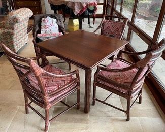 Square Game Table and four matching armchairs by McGuire. Very good condition.