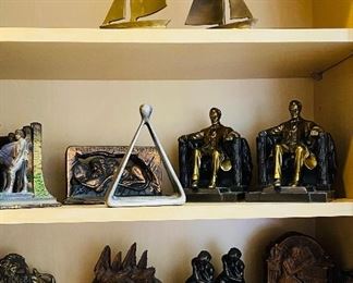 there is a large collection of antique book ends