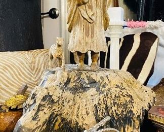 large primitive carving of Jesus and sheep