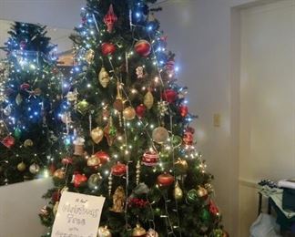 This picture does not do justice to this Christmas tree. Absolutely amazing. Over 100 ornaments and over 10 feet tall. You will love it.