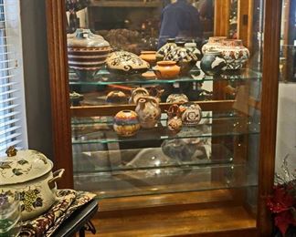 Beautiful lighted display cabinet with sliding glass front. The quality is exquisite.