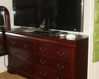 Cherry dresser and mirror. TV.
