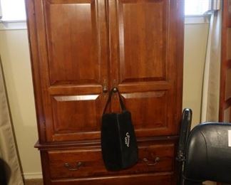Small storage armoire or TV cabinet.