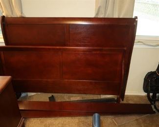 Queen-size sleigh bed.