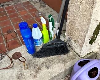 outdoor chemicals and watering can