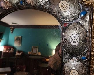 metal framed mirror detail