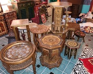 assortment of wooden tables, some with Mother of Pearl inlay
