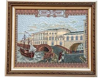 ST. PETERSBURG NEEDLEPOINT  |  Framed needlepoint embroidery with Cyrillic "Saint Petersberg" lettering, Russian receipt attached on verso - w. 24 x h. 20 in. (frame)
