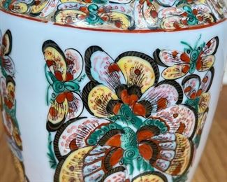 CHINESE BUTTERFLY VASE  |  Hand painted porcelain vase depicting a swarm of colorful butterflies or moths; with red "Hand Painted in Hong Kong" mark on bottom - h. 10 x dia. 6 in.