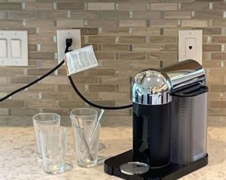 (9pc) NESPEESSO MACHINE & GLASS SET  |  A Nespresso VertuoLine espresso maker with four espresso glasses and four stirring rods - l. 10.5 x w. 8.25 x h. 12 in.