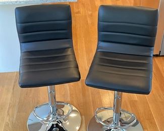 (2pc) PAIR BAR STOOLS  |  Two matching black bar stools on chrome stand with foot rest bar; adjustable height - l. 16 x w. 19 x h. 37 in.