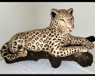 Large Leopard Resting on a Log 