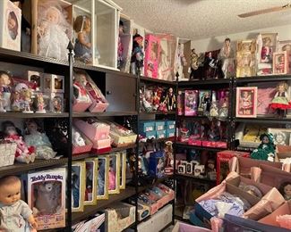 The doll room! Upper left shelf Kewpie Bride and Groom, Vintage Doll in case, Campbell's Soup dolls and ornaments, porcelain dolls