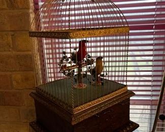 Mechanical birds in cage