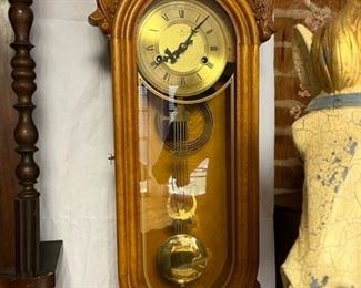 Light oak cased wall mounted clock