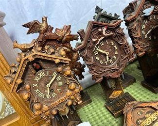 Faces on some of the Luxe miniature Cuckoo clocks