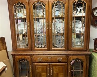 Vintage, lighted china cabinet with lots of storage