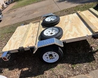 The trailer tilts in the middle.