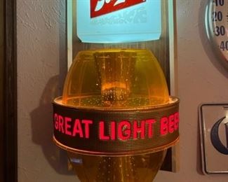 Schlitz lighted rotating sign. 