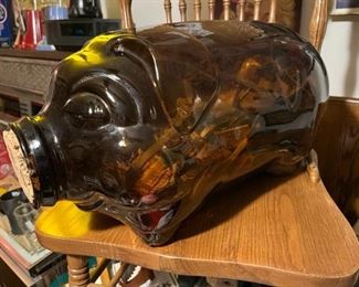 Glass pig full of matchbooks