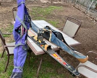 WE have two slalom skis and a pair of snow skis