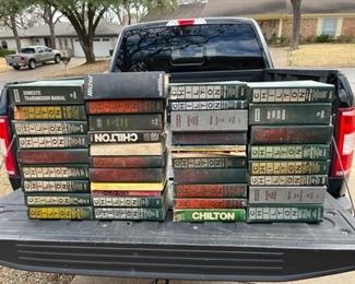 Large collection of automotive and truck repair manuals.