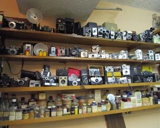 100's of cameras, bottles some poison