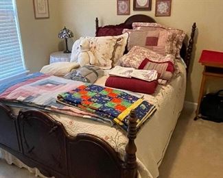 Beautiful 1920's Style Bed covered with Quits, Blankets and More!