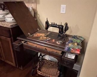 Antique Sewing Machine with Oak Cabinet